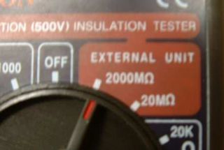 select ohms on multimeter
