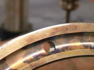 hole drilled through bearing race