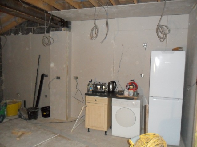 Kitchen with boarding started..