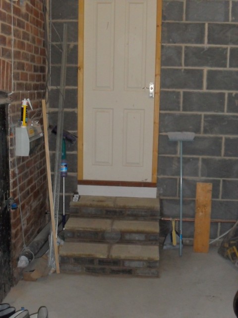 steps in the garage up to kitchen door