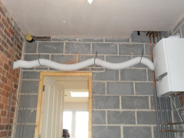 Ducting for my downstairs WC straight though my garage to the outside wall...