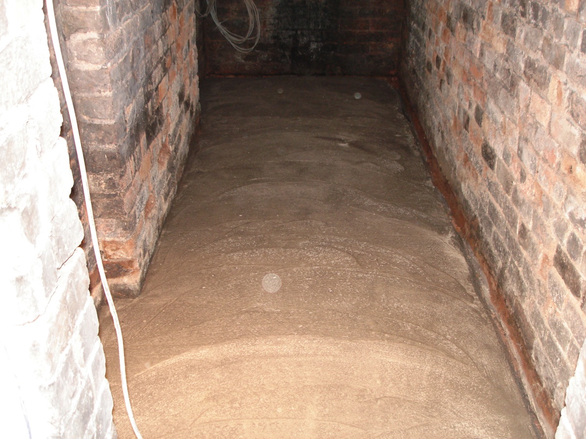 New concrete floor for coal cellar.