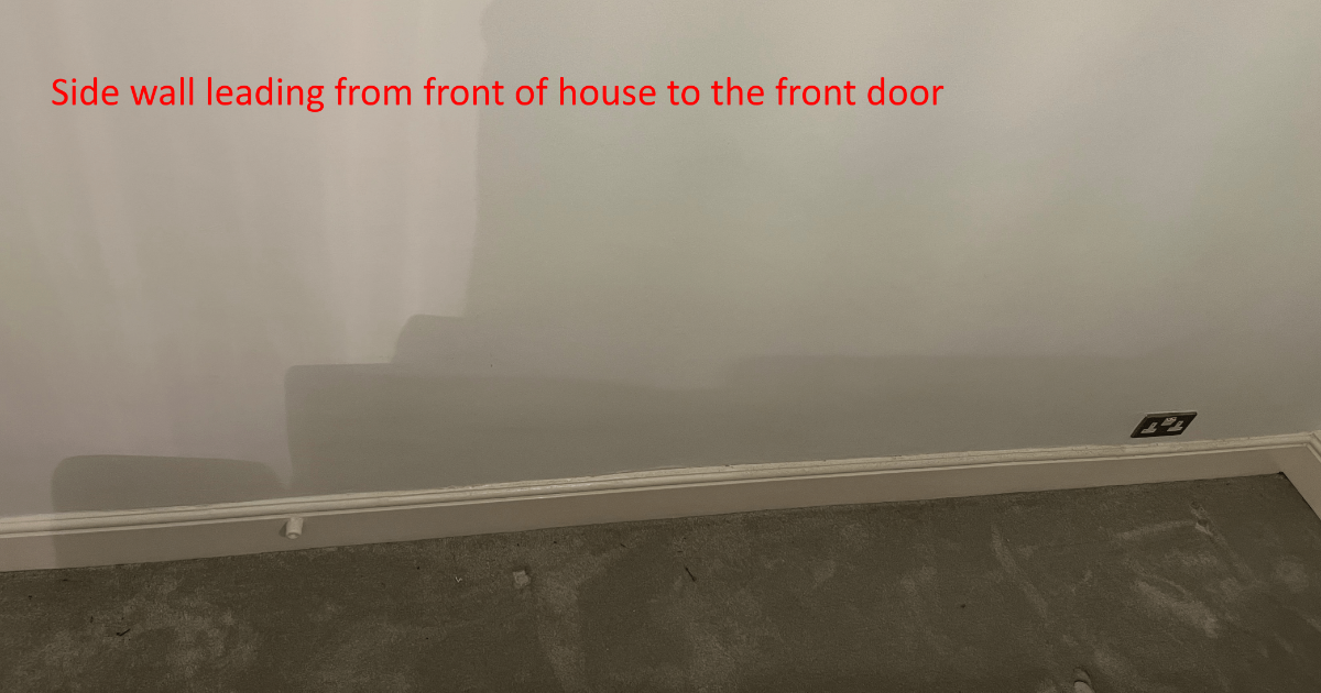 F. Inside wall of side of property_.png