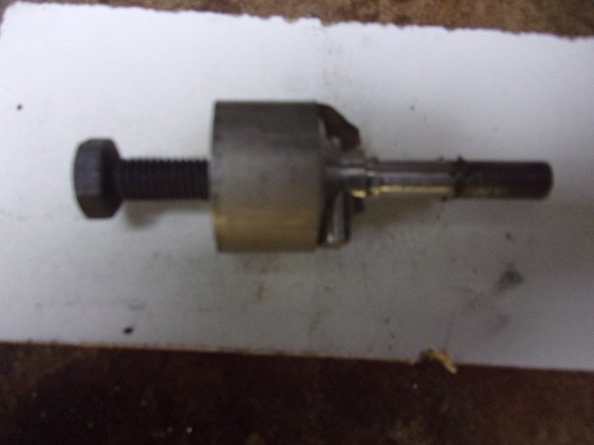 Quickest way was to design and make a very simple valve seat cutting tool; sorry about picture quality. The HSS cutter was located as seen; I ground the cutter at 45 degrees by eye; I could adjust the angle by turning the cutter; it worked a treat; the cutter was secured using an 8mm set screw allowing the cutter to be rotated using a &quot;T&quot; bar and socket.