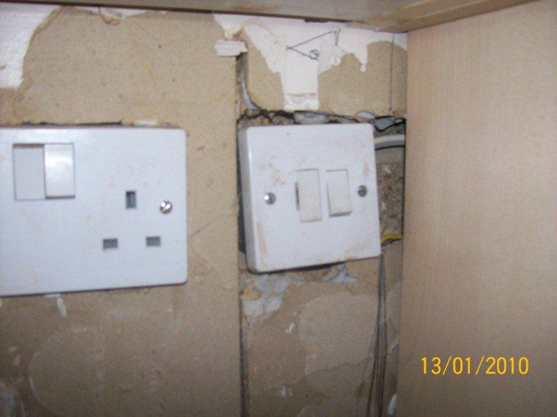 This is the Socket and the Cupboard I want to tile upto.