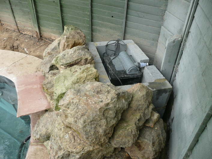 Step 7 - Build a waterfall from rocks and a housing for the filter and electrics.